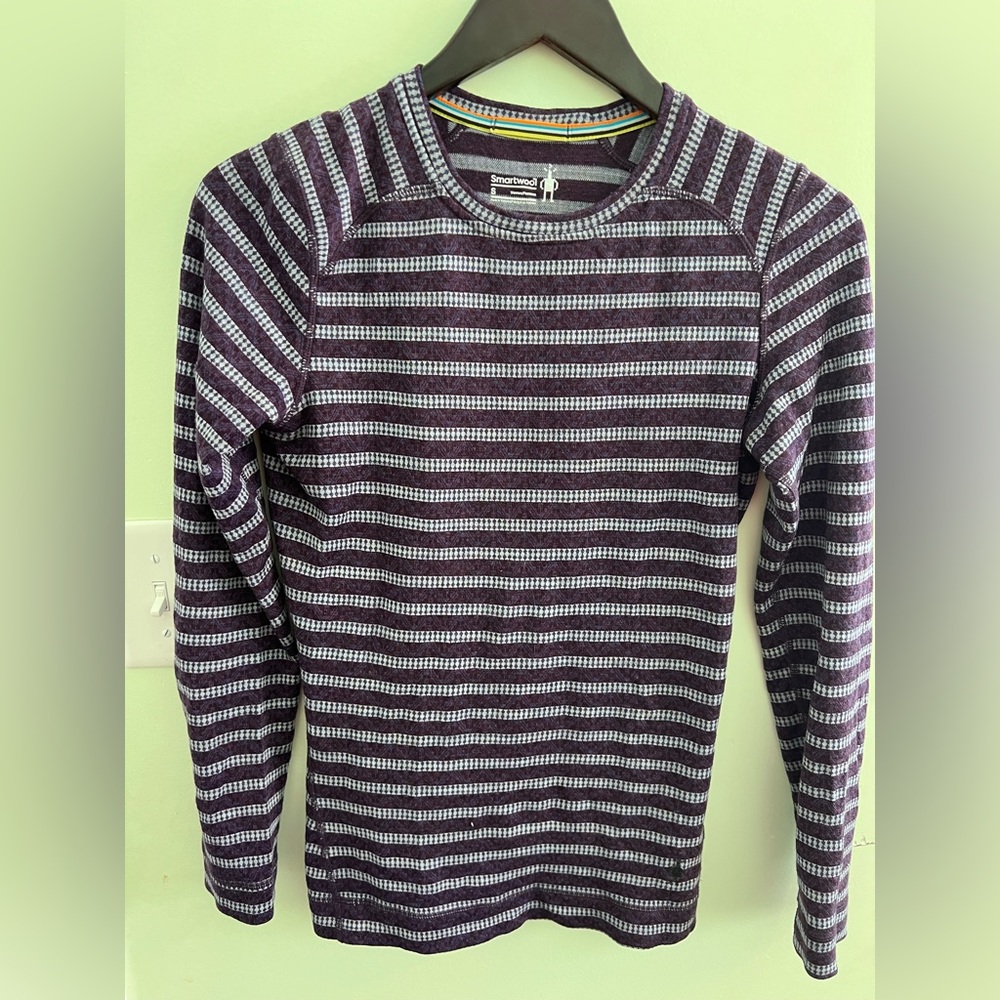 This Smartwool shirt will keep you warm and can be worn as a top or base layer.